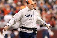 BLACKSBURG, VA - NOVEMBER 27:  Coach Al Groh of the Virginia Cavaliers questions a penalty call during a 24-10 loss to the Virginia Tech Hokies during a game on November 27, 2004, at Lane Stadium in Blacksburg, Virginia. (Photo By Grant Halverson/Getty Images)