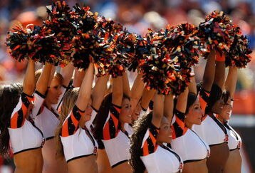 CINCINNATI, OH - SEPTEMBER 13:  Bengals cheerleaders entertain fans during the game between the Cincinnati Bengals  against the Denver Broncos at Paul Brown Stadium on September 13, 2009 in Cincinnati, Ohio. The Broncos defeated the Bengals 12-7. (Photo by Scott Boehm/Getty Images)