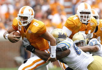 KNOXVILLE, TN - SEPTEMBER 12: David Carter #85 of the UCLA Bruins sacks Jonathan Crompton #8 of the Tennessee Volunteers on September 12, 2009 at Neyland Stadium in Knoxville, Tennessee. (Photo by Joe Murphy/Getty Images)