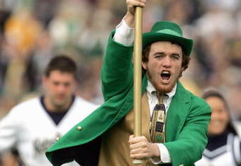 SOUTH BEND, IN - OCTOBER 13: The Leprechaun and cheerleaders of the Notre Dame Fighting Irish enter the field before the game against the Boston College Eagles on October 13, 2007 at Notre Dame Stadium in South Bend, Indiana. (Photo by Jonathan Daniel/Getty Images)