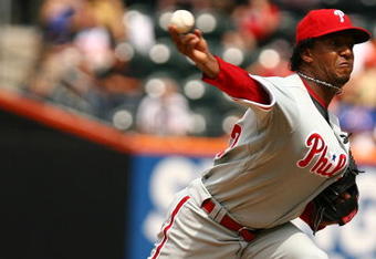 NEW YORK - AUGUST 23:  Pedro Martinez #45 of the Philadelphia Phillies pitches against The New York Mets during their game on August 23, 2009 at Citi Field in the Flushing neighborhood of the Queens borough of New York City.  (Photo by Al Bello/Getty Images)