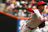 NEW YORK - AUGUST 23:  Pedro Martinez #45 of the Philadelphia Phillies pitches against The New York Mets during their game on August 23, 2009 at Citi Field in the Flushing neighborhood of the Queens borough of New York City.  (Photo by Al Bello/Getty Images)