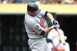 OAKLAND, CA - JUNE 11:  Michael Cuddyer #5 of the Minnesota Twins bats  against the Oakland Athletics during a Major League Baseball game on June 11, 2009 at the Oakland Coliseum in Oakland, California.  (Photo by Jed Jacobsohn/Getty Images)