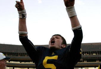 ANN ARBOR, MI - SEPTEMBER 12:  Quarterback Tate Forcier #5 celebrates with seconds left in the game against Notre Dame at Michigan Stadium on September 12, 2009 in Ann Arbor, Michigan.  (Photo by Domenic Centofanti/Getty Images)