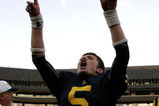 ANN ARBOR, MI - SEPTEMBER 12:  Quarterback Tate Forcier #5 celebrates with seconds left in the game against Notre Dame at Michigan Stadium on September 12, 2009 in Ann Arbor, Michigan.  (Photo by Domenic Centofanti/Getty Images)