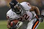 GREEN BAY, WI - SEPTEMBER 13: Matt Forte #22 of the Chicago Bears tries to gain yardage against the Green Bay Packers on September 13, 2009 at Lambeau Field in Green Bay, Wisconsin. The Packers defeated the Bears 21-15. (Photo by Jonathan Daniel/Getty Images)