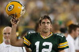 GREEN BAY, WI - SEPTEMBER 13: Aaron Rodgers #12 of the Green Bay Packers celebrates throwing the winning touchdown pass against the Chicago Bears on September 13, 2009 at Lambeau Field in Green Bay, Wisconsin. The Packers defeated the Bears 21-15. (Photo by Jonathan Daniel/Getty Images)