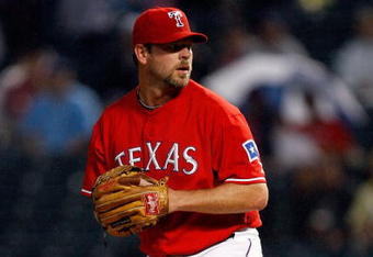 ARLINGTON, TX - SEPTEMBER 12:  Pitcher Kevin Millwood #33 of the Texas Rangers throws against the Seattle Mariners on September 12, 2009 at the Ballpark in Arlington, Texas.  (Photo by Ronald Martinez/Getty Images)