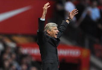 MANCHESTER, ENGLAND - AUGUST 29:  Arsenal Manager Arsene Wenger reacts during the Barclays Premier League match between Manchester United and Arsenal at Old Trafford on August 29, 2009 in Manchester, England.  (Photo by Laurence Griffiths/Getty Images)