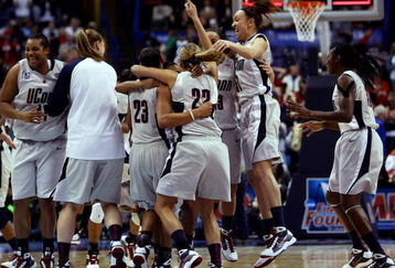 ST. LOUIS - APRIL 07:  The Connecticut Huskies celebrate the win during the NCAA Women's Final Four Championship game at the Scottrade Center against the Louisville Cardinals on April 7, 2009 in St. Louis, Missouri. The Connecticut Huskies defeated the Louisville Cardinals 76-54 to win the national title. The Huskies were undefeated this season.  (Photo by Elsa/Getty Images)