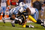PITTSBURGH, PA - SEPTEMBER 10: Quarterback Ben Roethlisberger #7 of the Pittsburgh Steelers is sacked by David Thorton and Jovan Haye #75 of the Tennessee Titans at Heinz Field on September 10, 2009 in Pittsburgh, Pennsylvania. The Steelers defeated the Titans 13-10 in overtime. (Photo by Scott Boehm/Getty Images)