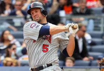 NEW YORK - MAY 17:  Michael Cuddyer #5 of the Minnesota Twins bats against the New York Yankees on May 17, 2009 at Yankee Stadium in the Bronx borough of New York City. The Yankees defeated the Twins 3-2 in ten innings.  (Photo by Jim McIsaac/Getty Images)