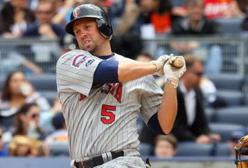 NEW YORK - MAY 17:  Michael Cuddyer #5 of the Minnesota Twins bats against the New York Yankees on May 17, 2009 at Yankee Stadium in the Bronx borough of New York City. The Yankees defeated the Twins 3-2 in ten innings.  (Photo by Jim McIsaac/Getty Images)