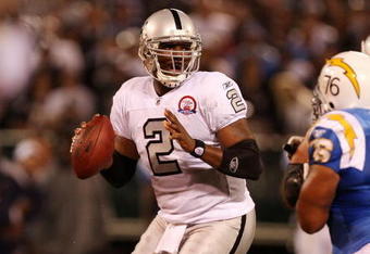 OAKLAND, CA - SEPTEMBER 14:  JaMarcus Russell #2 of the Oakland Raiders looks to pass against the San Diego Chargers on September 14, 2009 at the Oakland-Alameda County Coliseum in Oakland, California.  (Photo by Ezra Shaw/Getty Images)