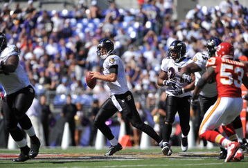 BALTIMORE - SEPTEMBER 13:  Joe Flacco #5 of the Baltimore Ravens looks to ass against the Kansas City Chiefs at M&T Bank Stadium on September 13, 2009 in Baltimore, Maryland. The Ravens defeated the Chiefs 38-24. (Photo by Larry French/Getty Images)