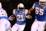 OAKLAND, CA - SEPTEMBER 14:  LaDainian Tomlinson #21 of the San Diego Chargers runs the ball against the Oakland Raiders on September 14, 2009 at the Oakland-Alameda County Coliseum in Oakland, California.  (Photo by Ezra Shaw/Getty Images)