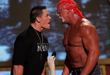 UNIVERSAL CITY, CA - AUGUST 14:  Wrestlers John Cena and Hulk Hogan present an award onstage at the 2005 Teen Choice Awards held at Gibson Amphitheatre at Universal CityWalk on August 14, 2005 in Universal City, California.  (Photo by Kevin Winter/Getty Images)
