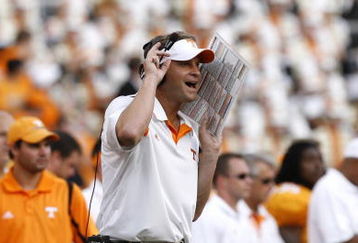 KNOXVILLE, TN - SEPTEMBER 12: Lane Kiffin, head coach of the Tennessee Volunteers yells from the sideline agianst the UCLA Bruins on September 12, 2009 at Neyland Stadium in Knoxville, Tennessee. The Bruins beat the Volunteers 19-15. (Photo by Joe Murphy/Getty Images)