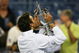 NEW YORK - SEPTEMBER 14:  Juan Martin Del Potro of Argentina kisses the championship trophy after defeating Roger Federer of Switzerland in the Men's Singles final on day fifteen of the 2009 U.S. Open at the USTA Billie Jean King National Tennis Center on September 14, 2009 in the Flushing neighborhood of the Queens borough of New York City. Del Potro defeated Federer 3-6, 7-6 (7), 4-6, 7-6 (7), 6-2.  (Photo by Matthew Stockman/Getty Images)
