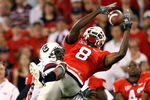 ATHENS, GA - SEPTEMBER 12:  A.J. Green #8 of the Georgia Bulldogs pulls in this reception against Akeem Auguste #3 of the South Carolina Gamecocks at Sanford Stadium on September 12, 2009 in Athens, Georgia.  (Photo by Kevin C. Cox/Getty Images)