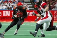 UNIONDALE, NY - APRIL 26:  Ricky Hall #49 of the New York Dragons runs the ball against the Cleveland Gladiators on April 26, 2008 at Nassau Coliseum in Uniondale, New York.  Dragons defeat Gladiators 56-39.  (Photo by Mike Stobe/Getty Images for the New York Dragons)  