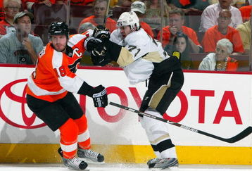 PHILADELPHIA - APRIL 25:  Evgeni Malkin #71 of the Pittsburgh Penguins skates against Mike Richards #18 of the Philadelphia Flyers during Game Six of the Eastern Conference Quarterfinal Round of the 2009 NHL Stanley Cup Playoffs  at the Wachovia Center on April 25, 2009 in Philadelphia, Pennsylvania. The Penguins defeated the Flyers 5-3 to win the series 4 games to 2.  (Photo by Jim McIsaac/Getty Images)