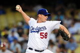 LOS ANGELES, CA - SEPTEMBER 02: Chad Billingsley #58 of the Los Angeles Dodgers pitches against the Arizona Diamondbacks on September 2, 2009 in Los Angeles, California.  (Photo by Jacob de Golish/Getty Images)