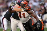 HOUSTON - OCTOBER 26:  Defensive end Robert Geathers #91 of the Cincinnati Bengals tries to fight through the block of tackle Eric Winston #73 of the Houston Texans on October 26, 2008 at Reliant Stadium in Houston, Texas. The Texans won 35-6.  (Photo by Stephen Dunn/Getty Images)