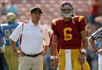 PASADENA, CA - DECEMBER 06:  Offensive coordinator Steve Sarkisian and quarterback Mark Sanchez of the USC Trojans talk during warm ups before the game against the UCLA Bruins on December 6, 2008 at the Rose Bowl in Pasadena, California.  (Photo by Stephen Dunn/Getty Images)