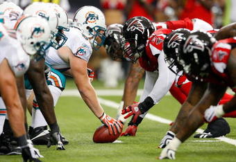 ATLANTA - SEPTEMBER 13:  The Miami Dolphins offense against the Atlanta Falcons defense at Georgia Dome on September 13, 2009 in Atlanta, Georgia.  (Photo by Kevin C. Cox/Getty Images)