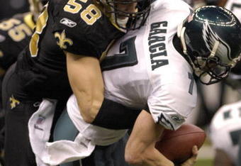 Philadelphia Eagles quarterback Jeff Garcia is sacked by  New Orleans Saints   linebacker Scott Shanle in an NFL second-round playoff game on January 13, 2007 in the Superdome in New Orleans, Louisiana.  (Photo by Al Messerschmidt/Getty Images)