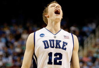 GREENSBORO, NC - MARCH 21:  Kyle Singler #12 of the Duke Blue Devils yells before facing the Texas Longhorns during the second round of the NCAA Division I Men's Basketball Tournament at the Greensboro Coliseum on March 21, 2009 in Greensboro, North Carolina.  (Photo by Streeter Lecka/Getty Images)
