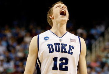 GREENSBORO, NC - MARCH 21:  Kyle Singler #12 of the Duke Blue Devils yells before facing the Texas Longhorns during the second round of the NCAA Division I Men's Basketball Tournament at the Greensboro Coliseum on March 21, 2009 in Greensboro, North Carolina.  (Photo by Streeter Lecka/Getty Images)