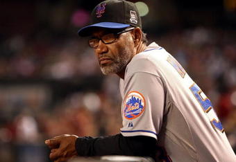 PHOENIX - AUGUST 10:  Manager Jerry Manuel of the New York Mets looks on from the dugout during the game against the Arizona Diamondbacks at Chase Field on August 10, 2009 in Phoenix, Arizona. The Diamondbacks defeated the Mets 7-4.  (Photo by Christian Petersen/Getty Images)