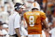 KNOXVILLE, TN - SEPTEMBER 12: Lane Kiffin, head coach of  the Tennessee Volunteers talks with Jonathan Crompton #8 of the Tennessee Volunteers during a timeout against the UCLA Bruins on September 12, 2009 at Neyland Stadium in Knoxville, Tennessee. The Bruins beat the Volunteers 19-15. (Photo by Joe Murphy/Getty Images)