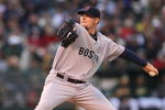 OAKLAND, CA - APRIL 13:  John Lester #31 of the Boston Red Sox pitches against the Oakland Athletics during a Major League Baseball game on April 13, 2009 at the Oakland Coliseum in Oakland, California.  (Photo by Jed Jacobsohn/Getty Images)