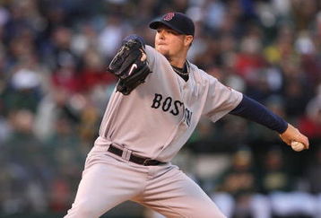 OAKLAND, CA - APRIL 13:  John Lester #31 of the Boston Red Sox pitches against the Oakland Athletics during a Major League Baseball game on April 13, 2009 at the Oakland Coliseum in Oakland, California.  (Photo by Jed Jacobsohn/Getty Images)
