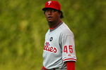 CHICAGO - AUGUST 12: Pedro Martinez #45 of the Philadelphia Phillies stretches in the outfield before a game against the Chicago Cubs on August 12, 2009 at Wrigley Field in Chicago, Illinois. The Phillies defeated the Cubs 12-5. (Photo by Jonathan Daniel/Getty Images)