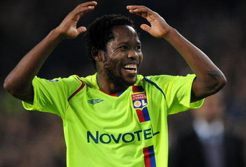 BARCELONA, SPAIN - MARCH 11:  Jean II Makoun of Lyon reacts during the UEFA Champions League, First knock-out round, second leg match between Barcelona and Lyon at the Camp Nou stadium on March 11, 2009 in Barcelona, Spain. Barcelona won the match 5-2.  (Photo by Jasper Juinen/Getty Images)