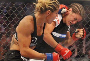 SAN JOSE, CA - AUGUST 15:  Cris Cyborg (L) battles Gina Carano during their Middleweight Championship fight at Stikeforce: Carano vs. Cyborg on August 15, 2009 in San Jose, California.  (Photo by Jon Kopaloff/Getty Images)