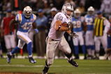 OAKLAND, CA - SEPTEMBER 14:  Zach Miller #80 of the Oakland Raiders runs for yards after the catch against Clinton Hart #42 of the San Diego Chargers on September 14, 2009 at the Oakland-Alameda County Coliseum in Oakland, California.  (Photo by Ezra Shaw/Getty Images)