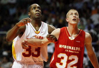 CORAL GABLES, FL - APRIL 01:  Alex Oriakhi #33 of the East Team battles for position with Mason Plumlee #32 of the West Team in the 2009 McDonald's All American Men's High School Basketball Game at BankUnited Center on April 1, 2009 in Coral Gables, Florida.  (Photo by Doug Benc/Getty Images)