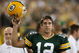 GREEN BAY, WI - SEPTEMBER 13: Aaron Rodgers #12 of the Green Bay Packers celebrates throwing the winning touchdown pass against the Chicago Bears on September 13, 2009 at Lambeau Field in Green Bay, Wisconsin. The Packers defeated the Bears 21-15.  (Photo by Jonathan Daniel/Getty Images)
