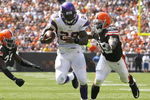 CLEVELAND - SEPTEMBER 13:  Adrian Peterson #28 of the Minnesota Vikings runs by Brodney Pool #21 and Corey Willams #99 of the Cleveland Brwons at Cleveland Browns Stadium on September 13, 2009 in Cleveland, Ohio.  (Photo by Matt Sullivan/Getty Images)