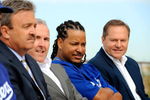 GLENDALE, AZ - MARCH 05:  Manny Ramirez#99 (2R) general manager Ned Colletti (L) owner Frank McCourt and Ramirez's agent Scott Booras  (R) look on during a news conference on March 5, 2009, at Camelback Ranch in Glendale, Arizona. Ramirez signed a $45 million two-year contract on Wednesday.  (Photo by Kevork Djansezian/Getty Images)