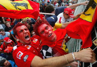 3 Mar 2002:  Ferrari fans go wild after Michael Schumacher won the 2002 Fosters Australian Grand Prix  at the Albert Park Circuit, Melbourne, Australia. DIGITAL IMAGE. Mandatory Credit: Mark Thompson/ALLSPORT
