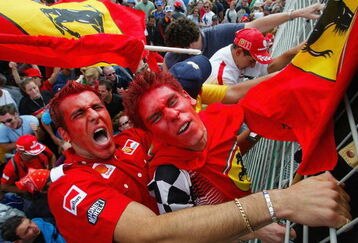 3 Mar 2002:  Ferrari fans go wild after Michael Schumacher won the 2002 Fosters Australian Grand Prix  at the Albert Park Circuit, Melbourne, Australia. DIGITAL IMAGE. Mandatory Credit: Mark Thompson/ALLSPORT