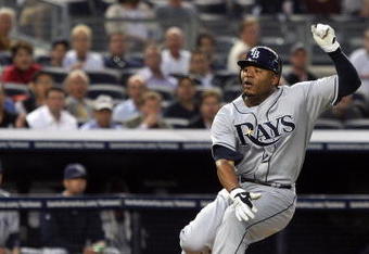 NEW YORK - SEPTEMBER 08:  Carl Crawford #13 of the Tampa Bay Rays is caught in a first inning rundown against the New York Yankees on September 8, 2009 at Yankee Stadium in the Bronx borough of New York City.  (Photo by Jim McIsaac/Getty Images)