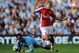 MANCHESTER, ENGLAND - SEPTEMBER 12:  Gael Clichy (R) of Arsenal is tackled by Joleon Lescott during the Barclays Premier League match between Manchester City and Arsenal at the City of Manchester Stadium on September 12, 2009 in Manchester, England.  (Photo by Shaun Botterill/Getty Images)