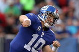 EAST RUTHERFORD, NJ - SEPTEMBER 13:  Eli Manning #10 of the New York Giants throws a pass against the Washington Redskins on September 13, 2009 at Giants Stadium in East Rutherford, New Jersey.  (Photo by Jim McIsaac/Getty Images)